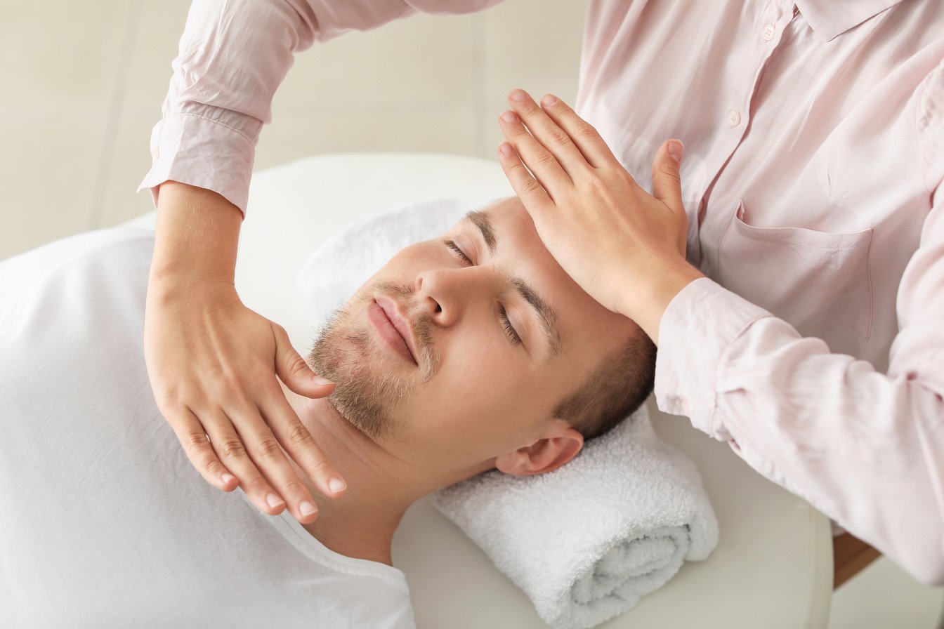 Reiki Master Working with Patient